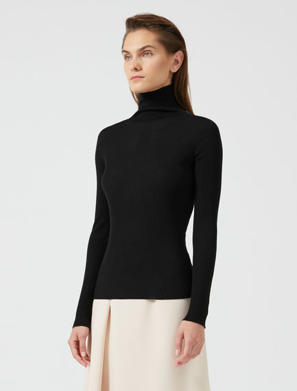 Maglia roll-neck a coste