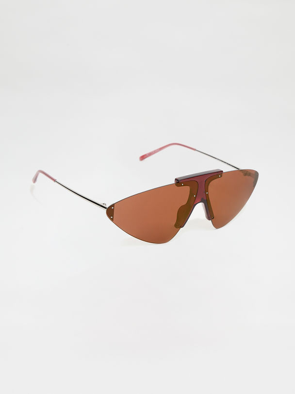 Occhiale con lente triangolare