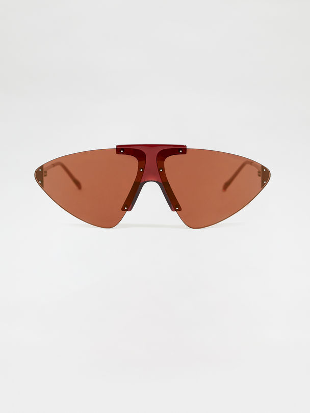 Occhiale con lente triangolare