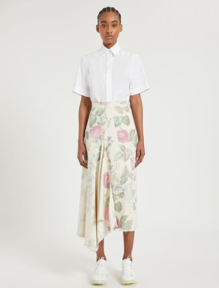 Gonna asimmetrica con maxi rose