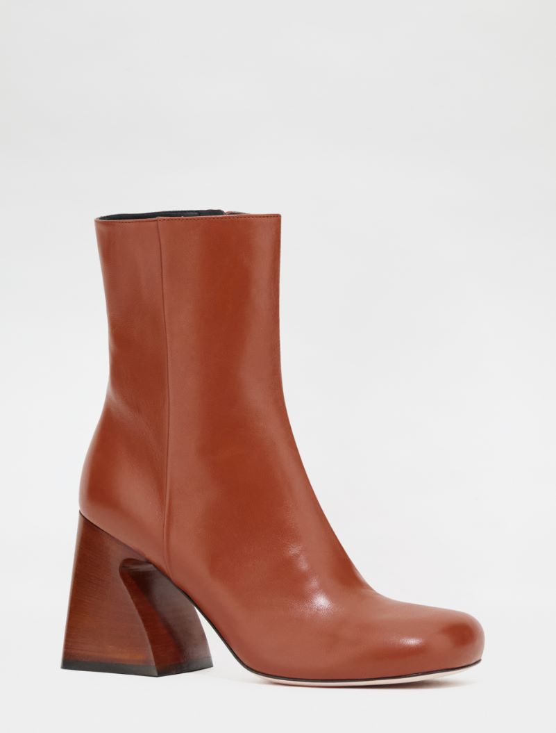 acne deconstructed boots